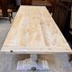 Industrial table with sandblasted top and bleached legs.