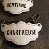 Enameled plates for bottles