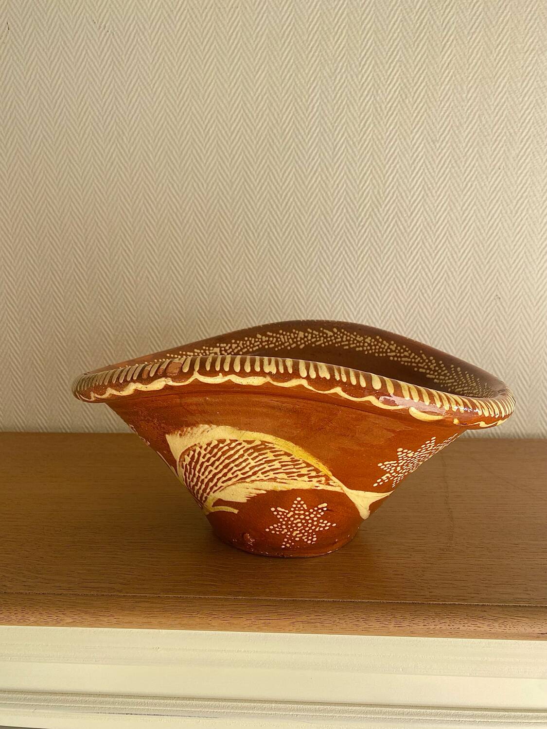 Old glazed terracotta plate, Portuguese craftsmanship.