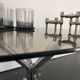 Table basse années 70 chrome et verre fumé