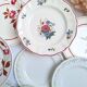Vintage flower dessert plates from Sarreguemines, Longwy, and Lunéville.