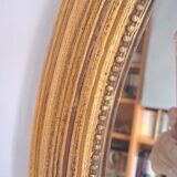 Miroir ancien en bois doré