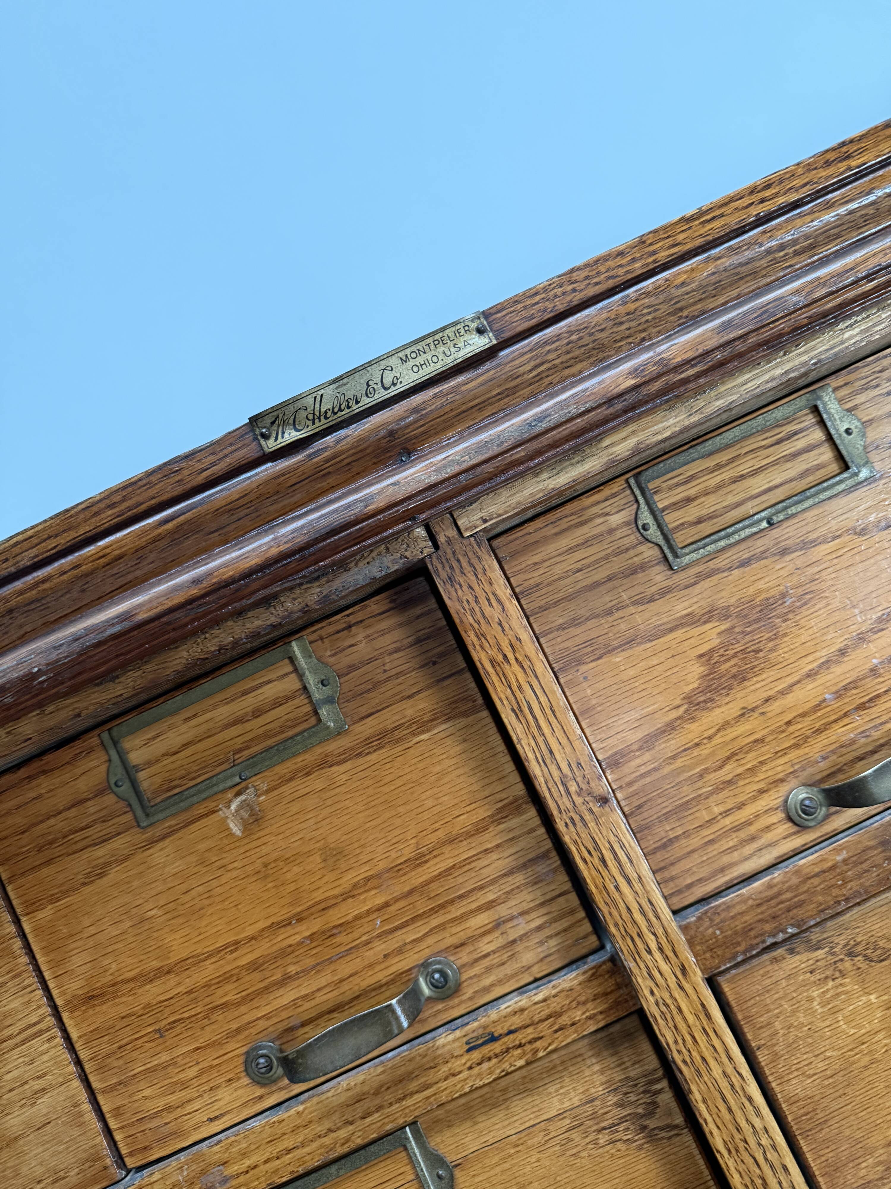 Antique very large American oak grain / apothecary cabinet, ca 1900