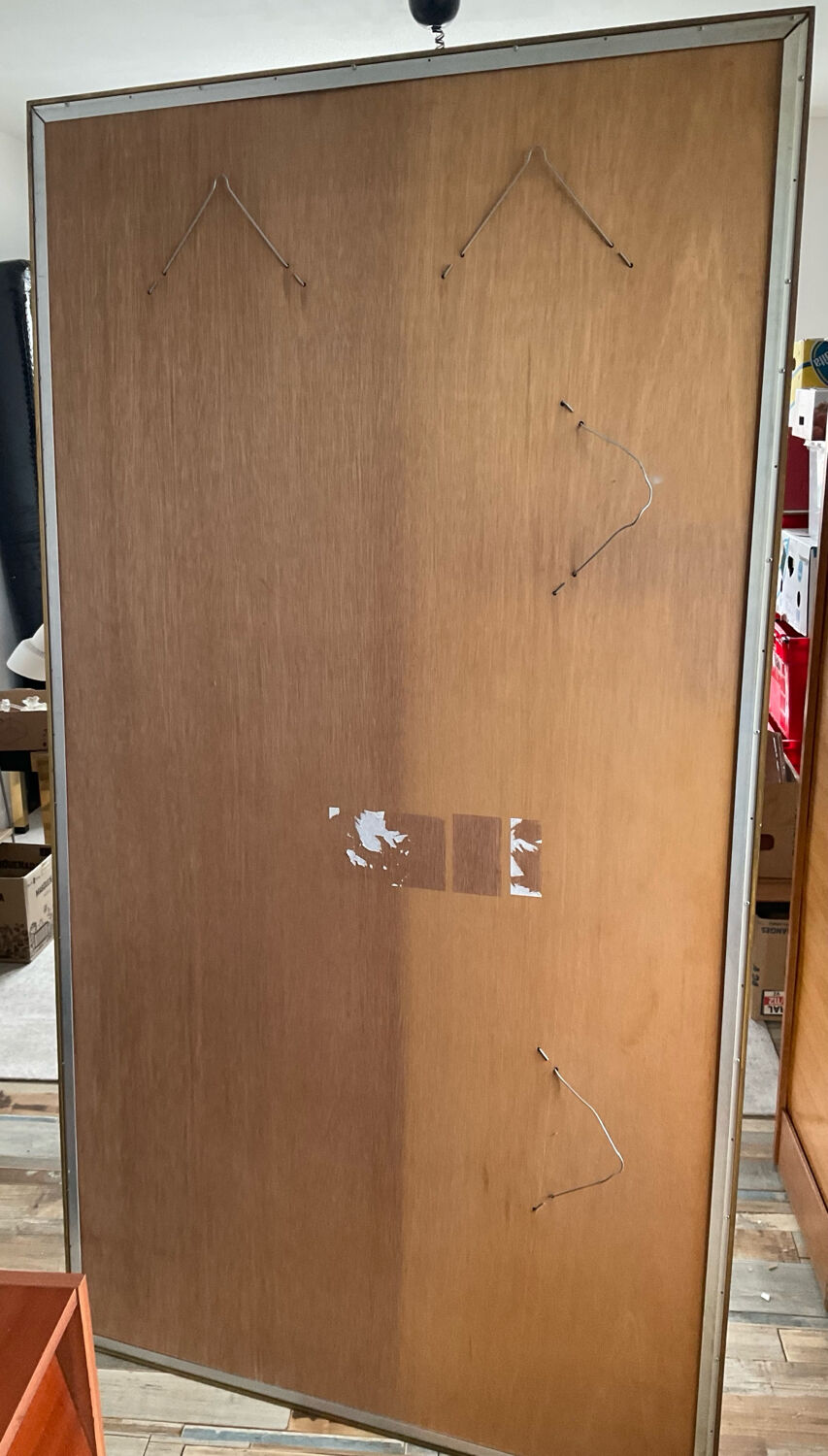 Large vintage Hollywood Regency style mirror with shutters.