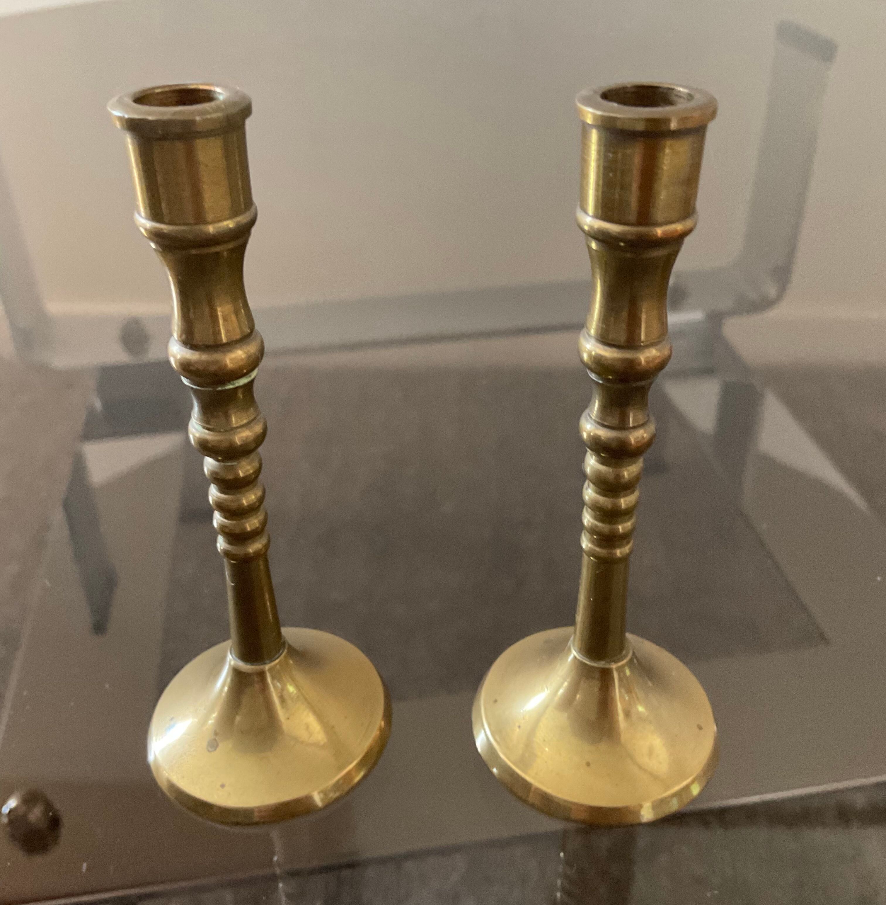 Pair of miniature bronze torches