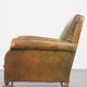 Green antique English cowhide leather armchair on wheels