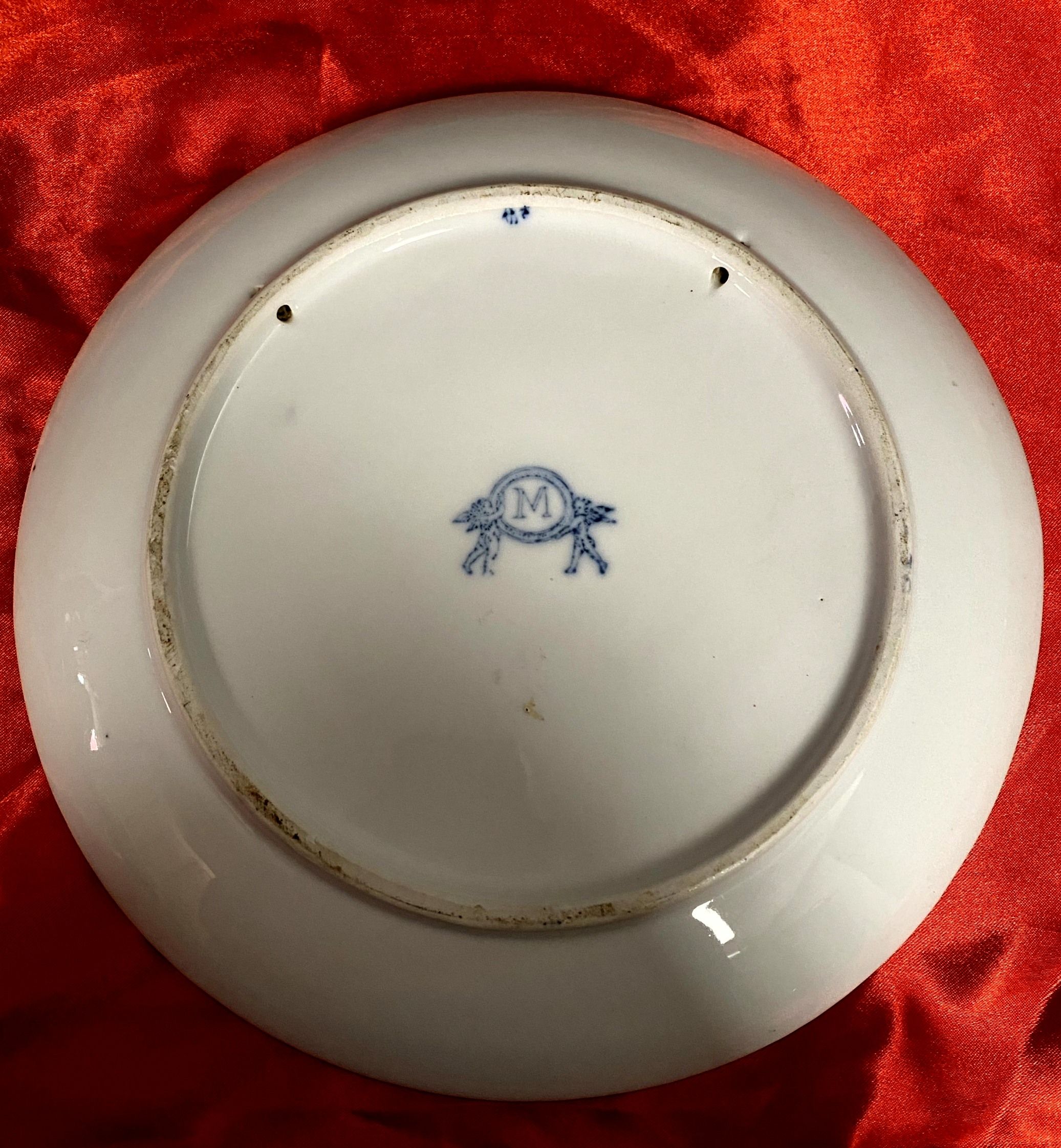 Pair of dishes with cherubs