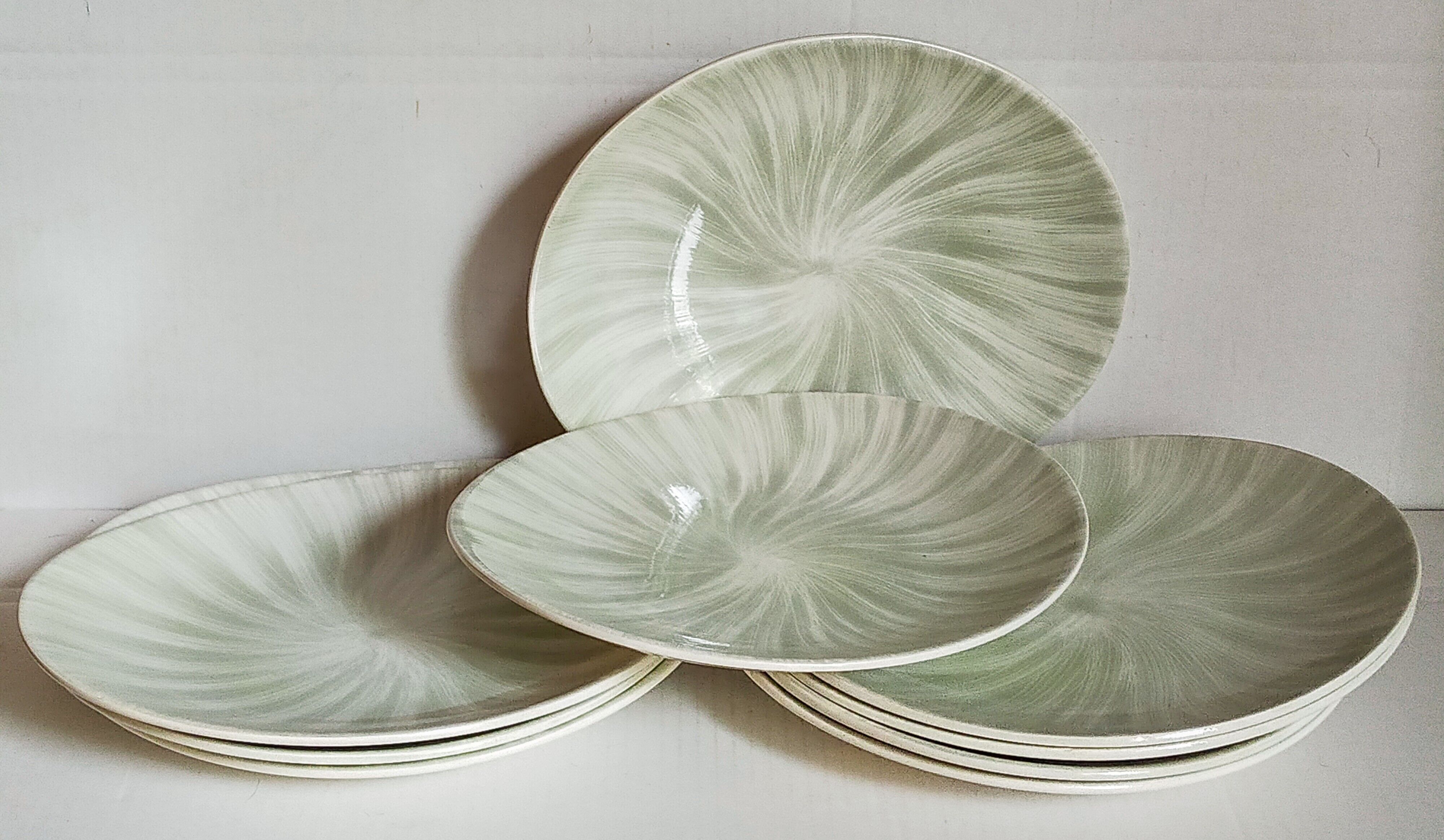 Nine earthenware plates from Salins-les-Bains vintage