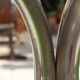 Oval glass and stainless steel table 70s