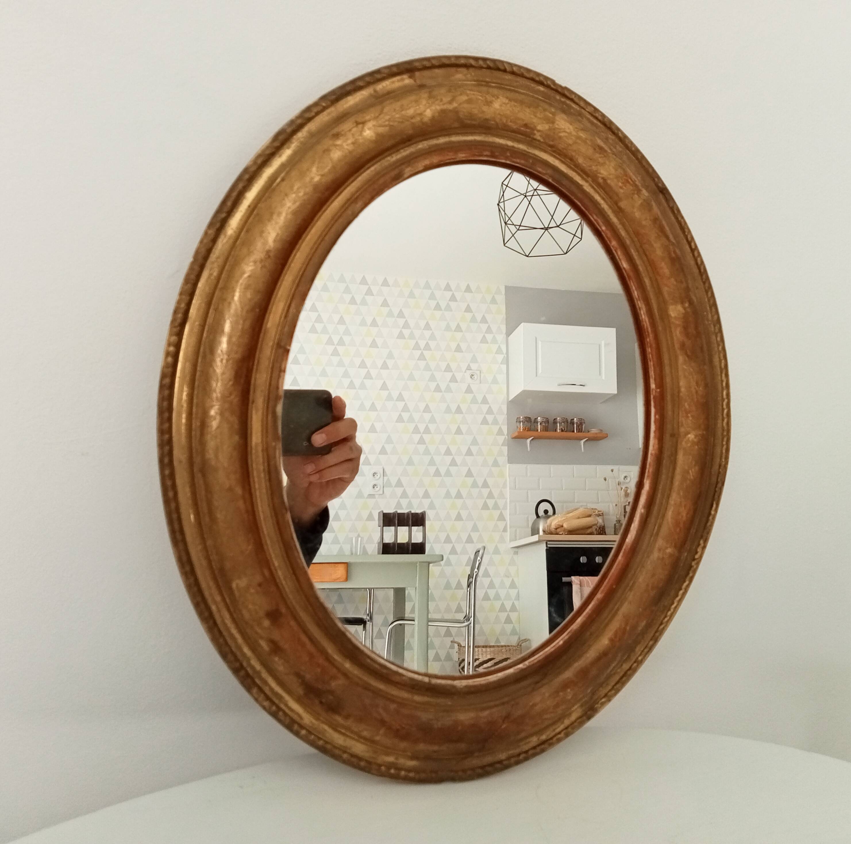 Louis Philippe 19th century oval gilded mirror in wood and stucco