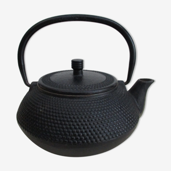 Black cast iron teapot