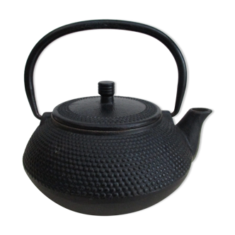 Black cast iron teapot