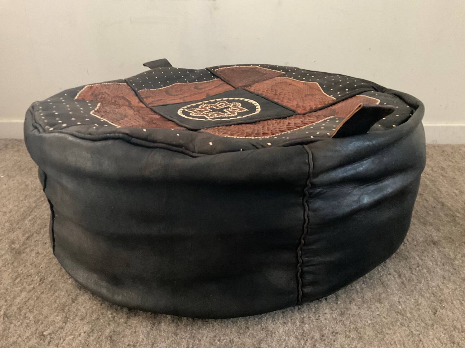 Vintage leather and snakeskin pouf