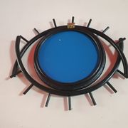 Black rattan mirror in the shape of an eye, 40x35 cm