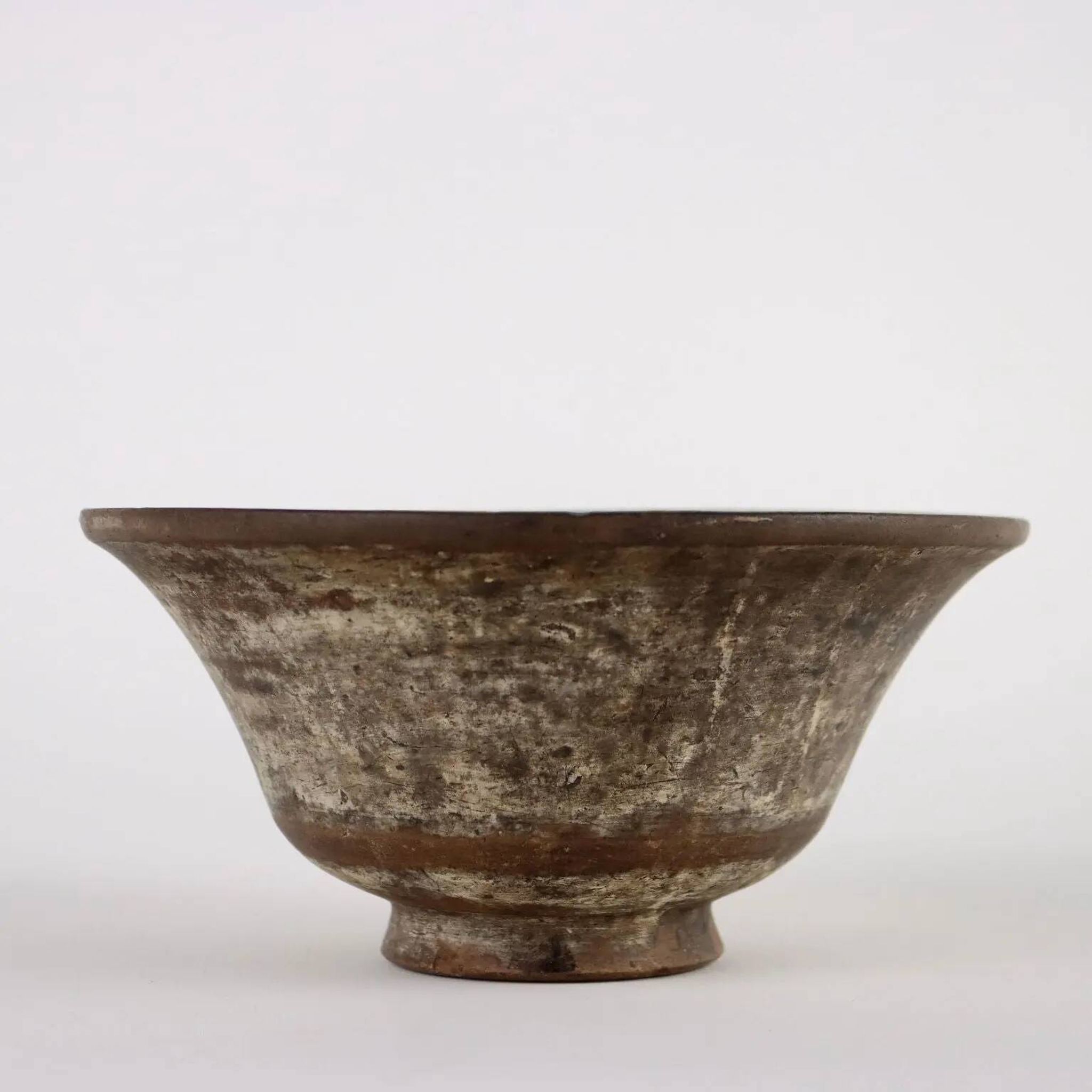 Antique cup from the early 19th century in decorated terracotta.