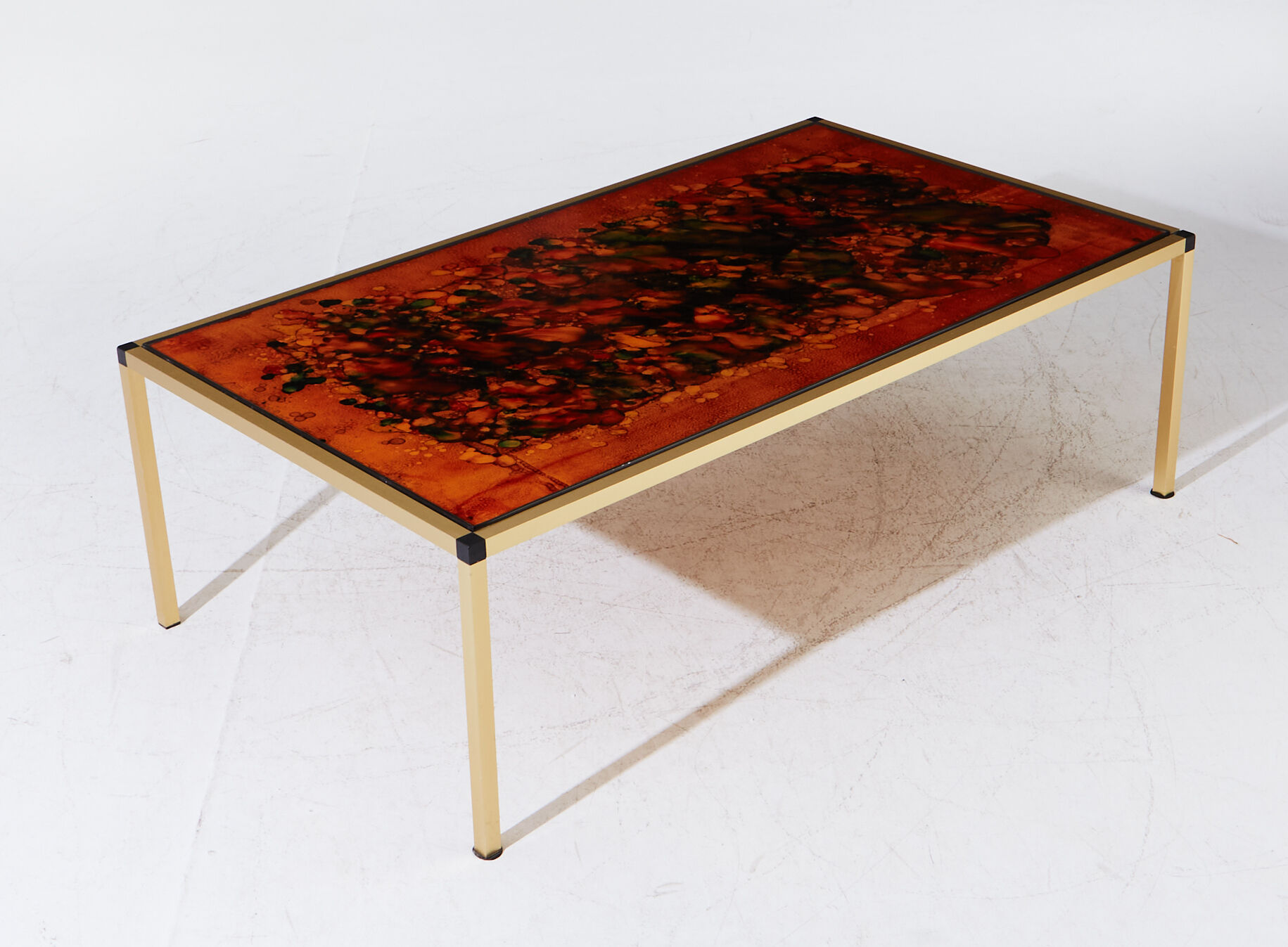 Vintage coffee table in brass and glass