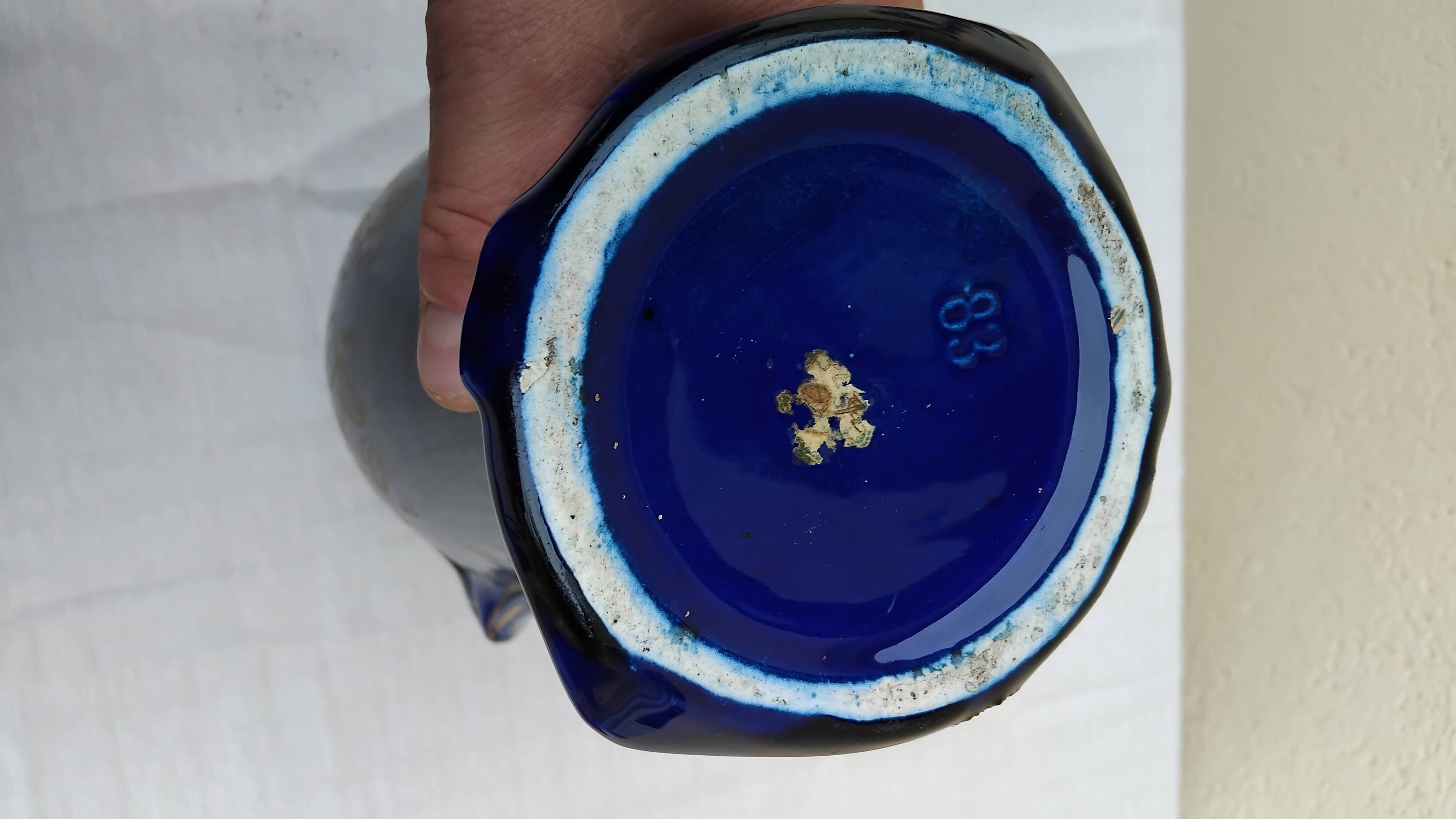Large antique blue earthenware vase