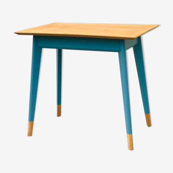 Table pieds compas bleue