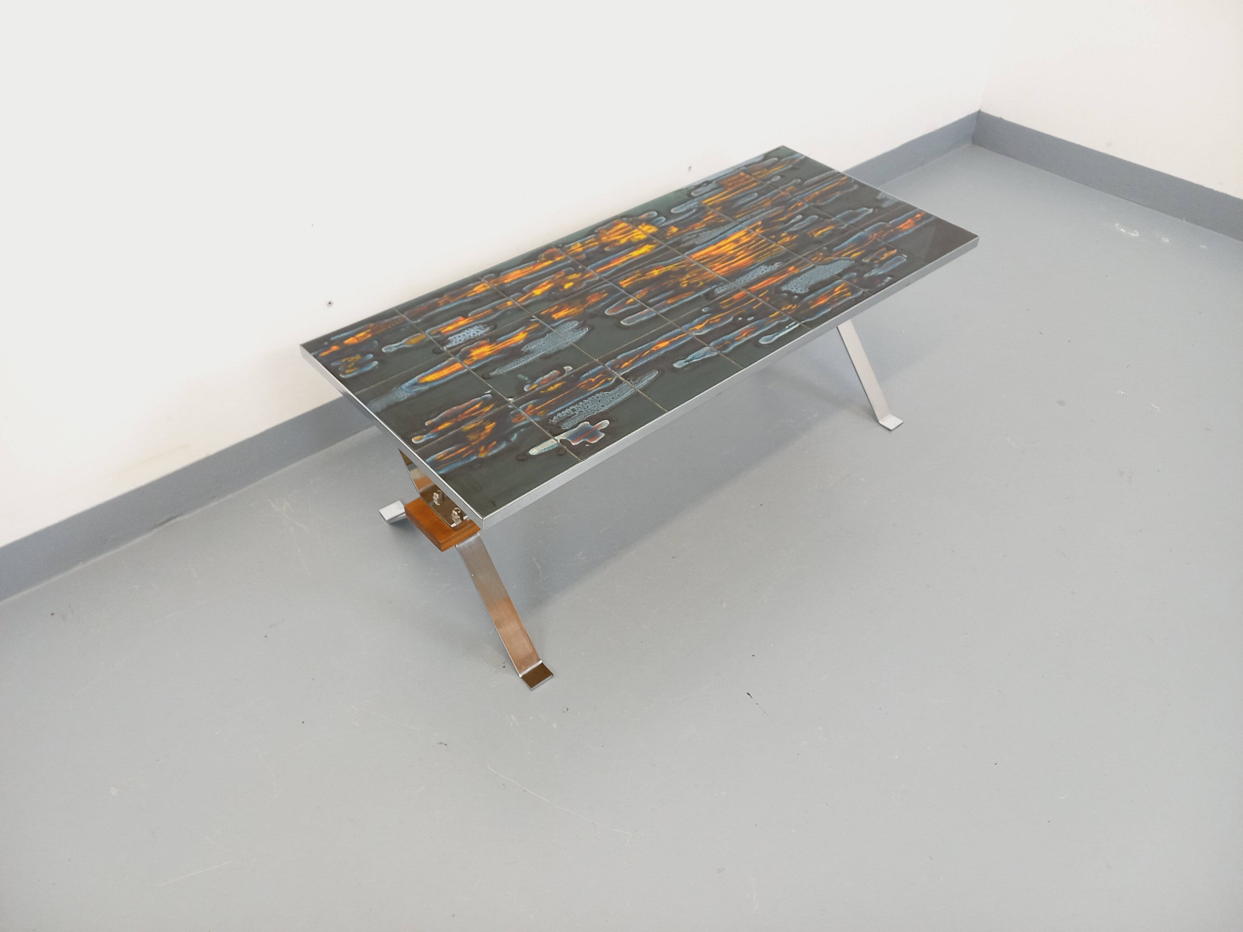 Vintage coffee table from the 60s and 70s in ceramic, chrome metal, and wood.