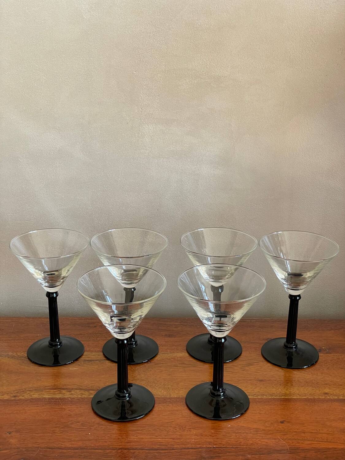 6 black stemmed glasses