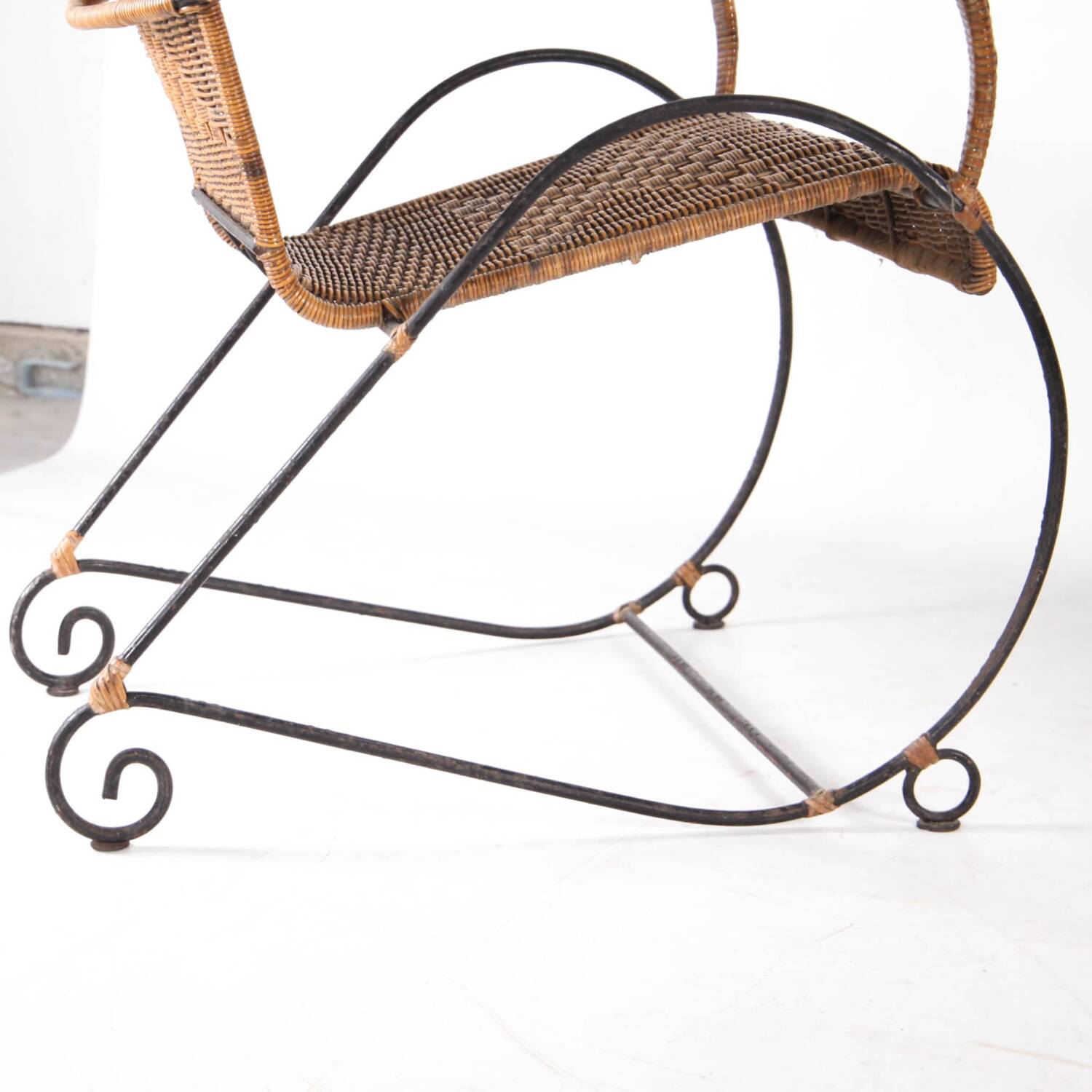 Pair of rattan and iron armchairs