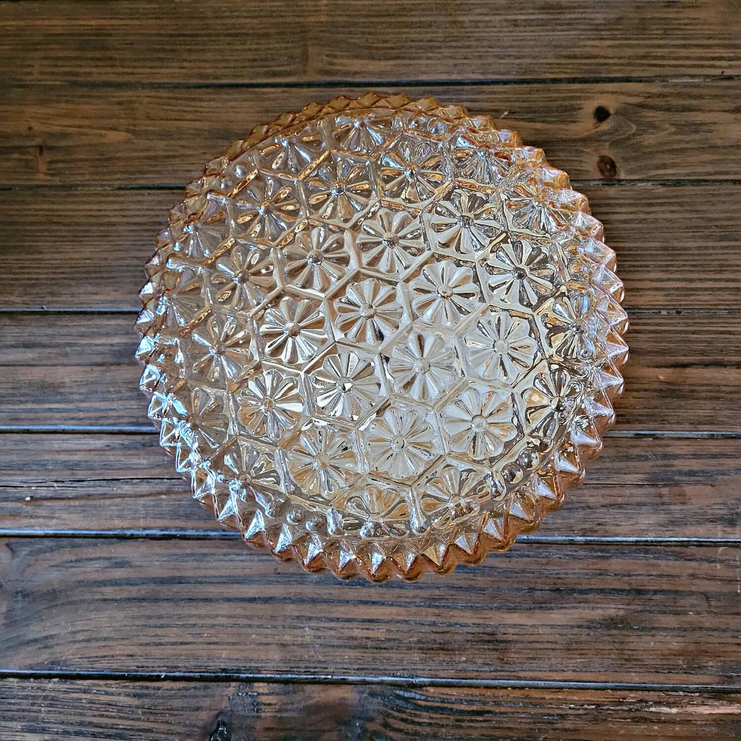 Large vintage ceiling or wall lamp in tinted molded glass with flower decoration