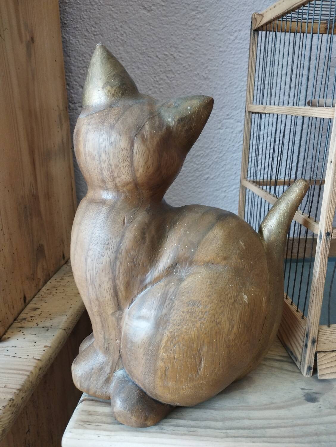 Wooden cat sculpture