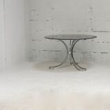 Living room table "Space Age" polished steel, circular slab smoked glass. France, circa 1970.