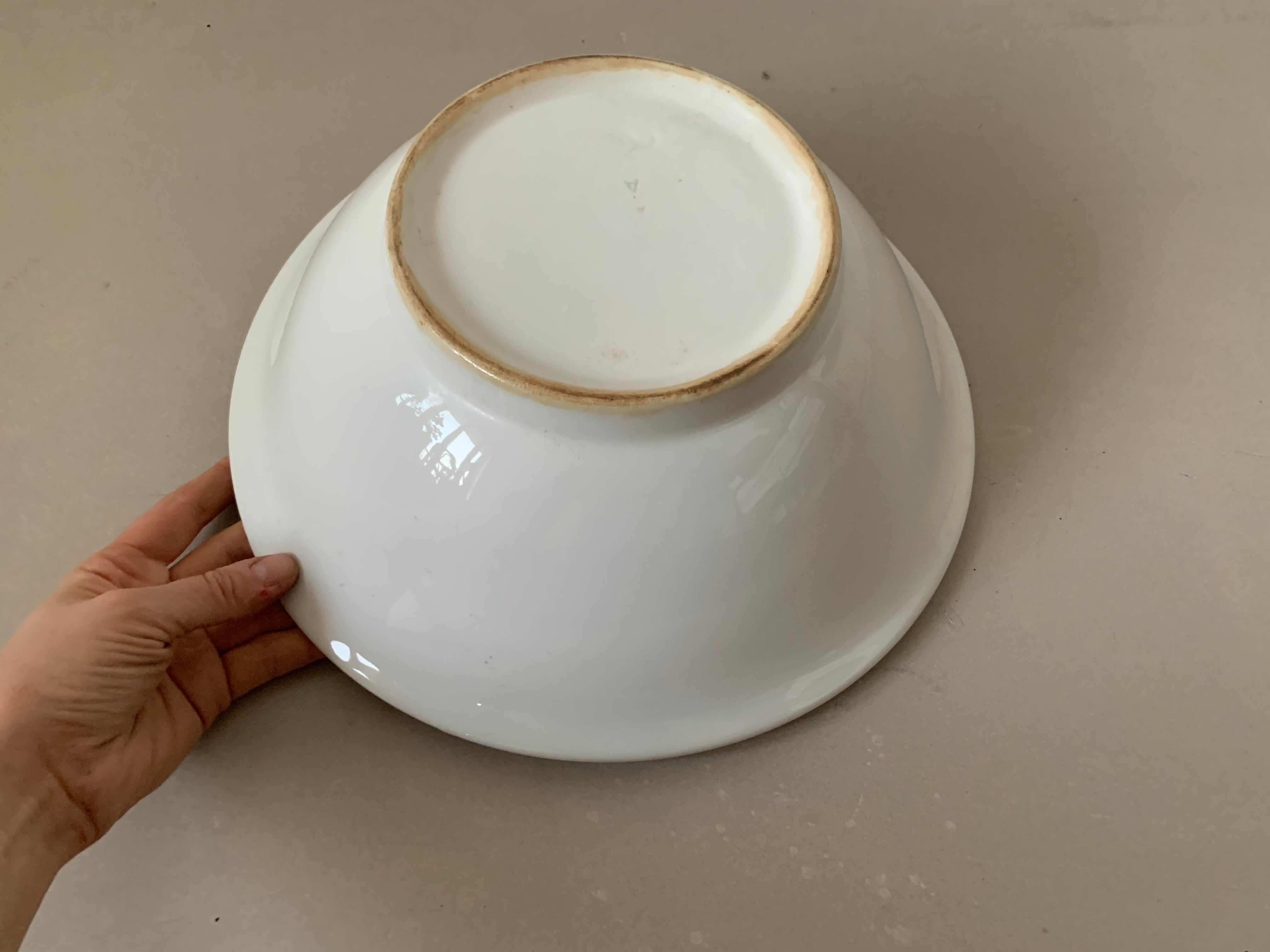 Old white salad bowl