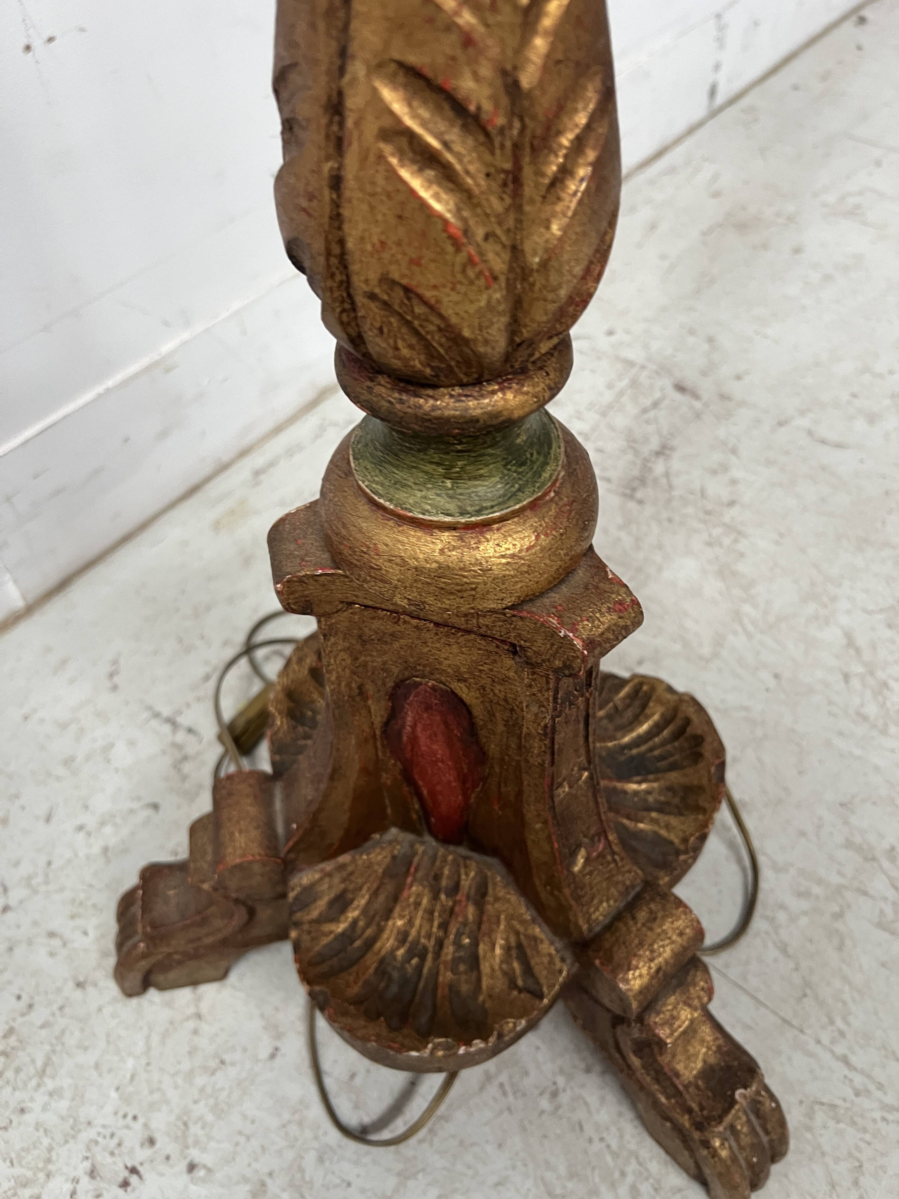 Polychrome carved wooden floor lamp, 20th century.