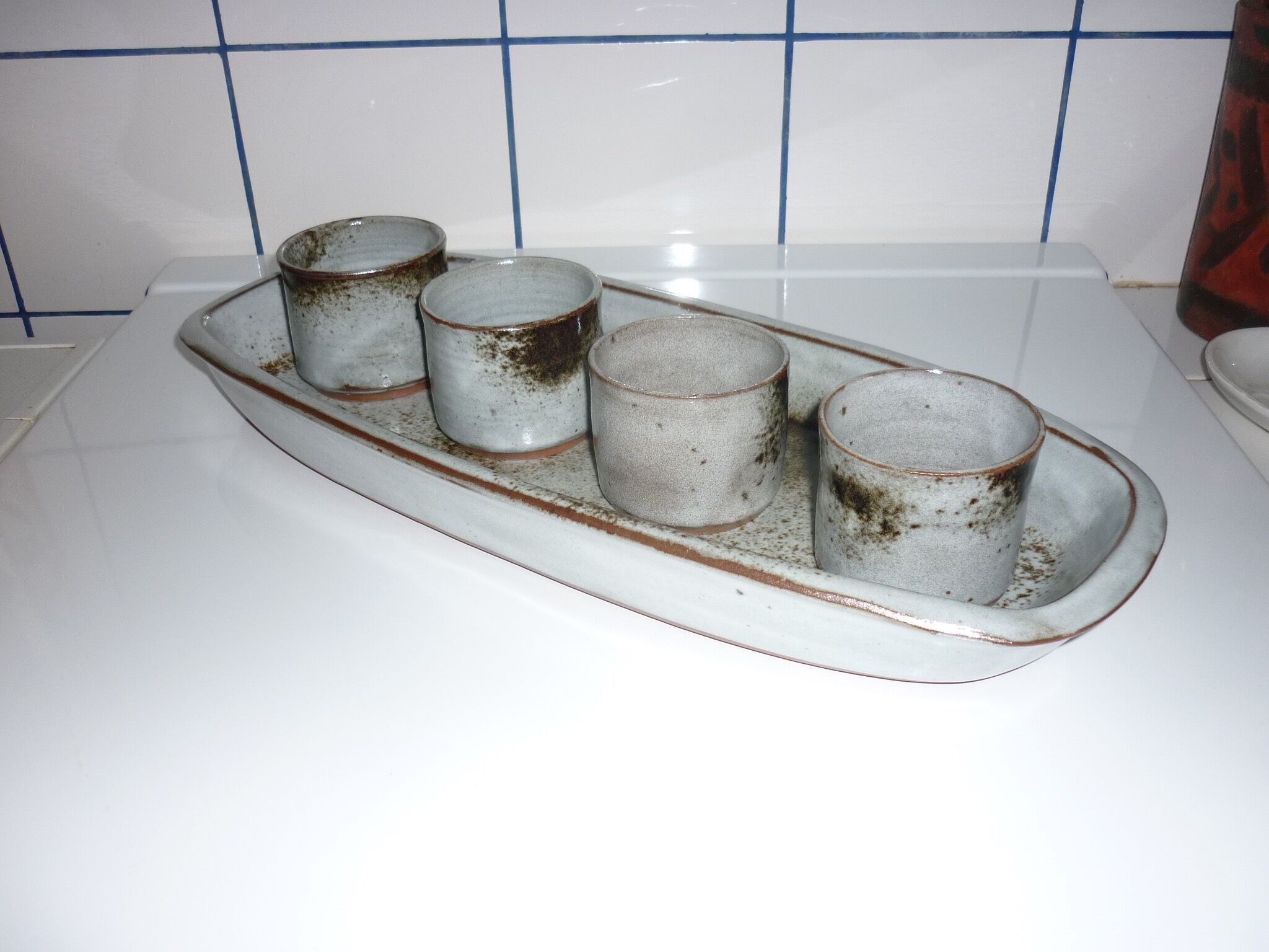 Ceramic fish dish and 4 pots for sauces from the 1960s