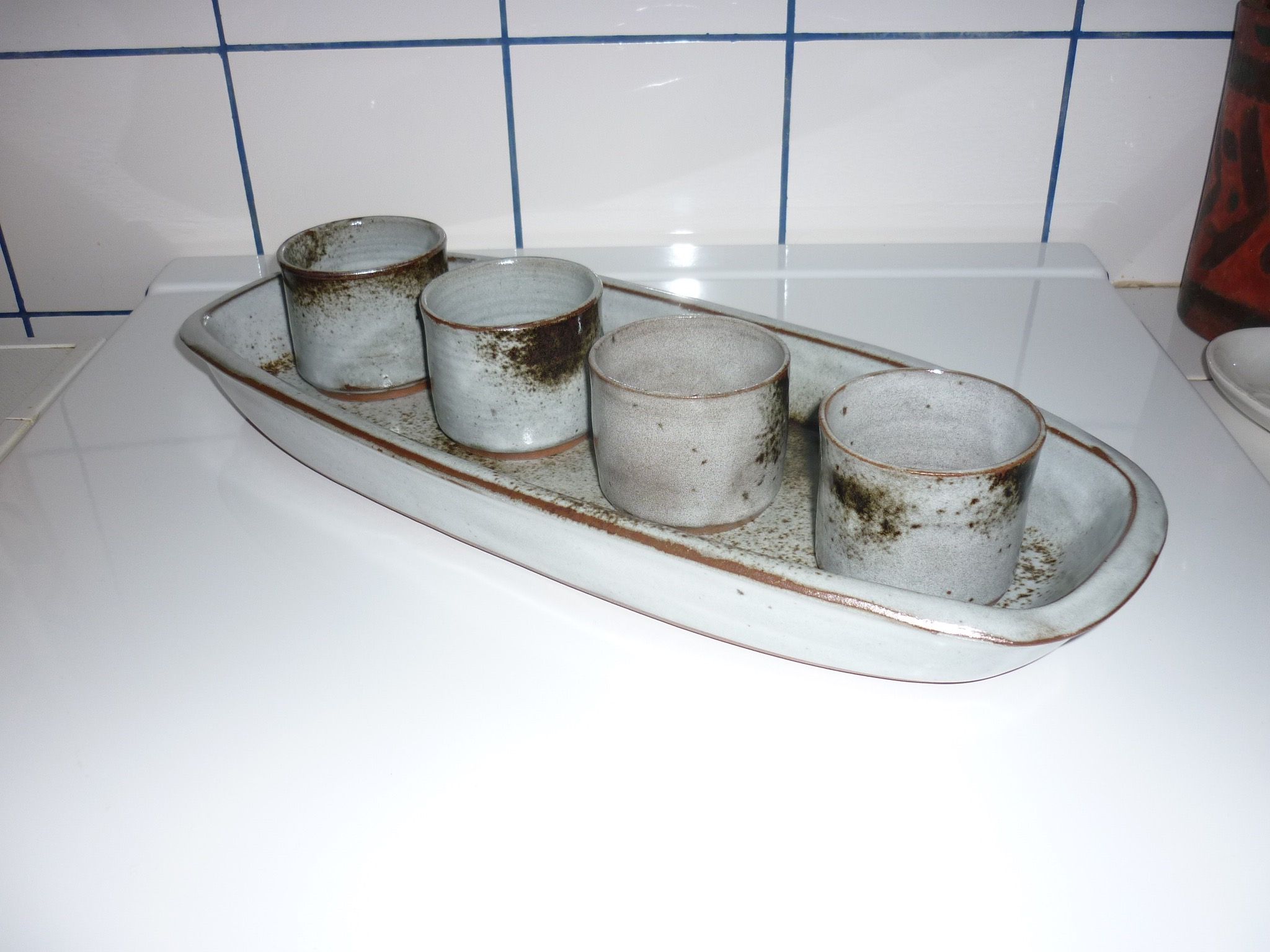 Ceramic fish dish and 4 pots for sauces from the 1960s