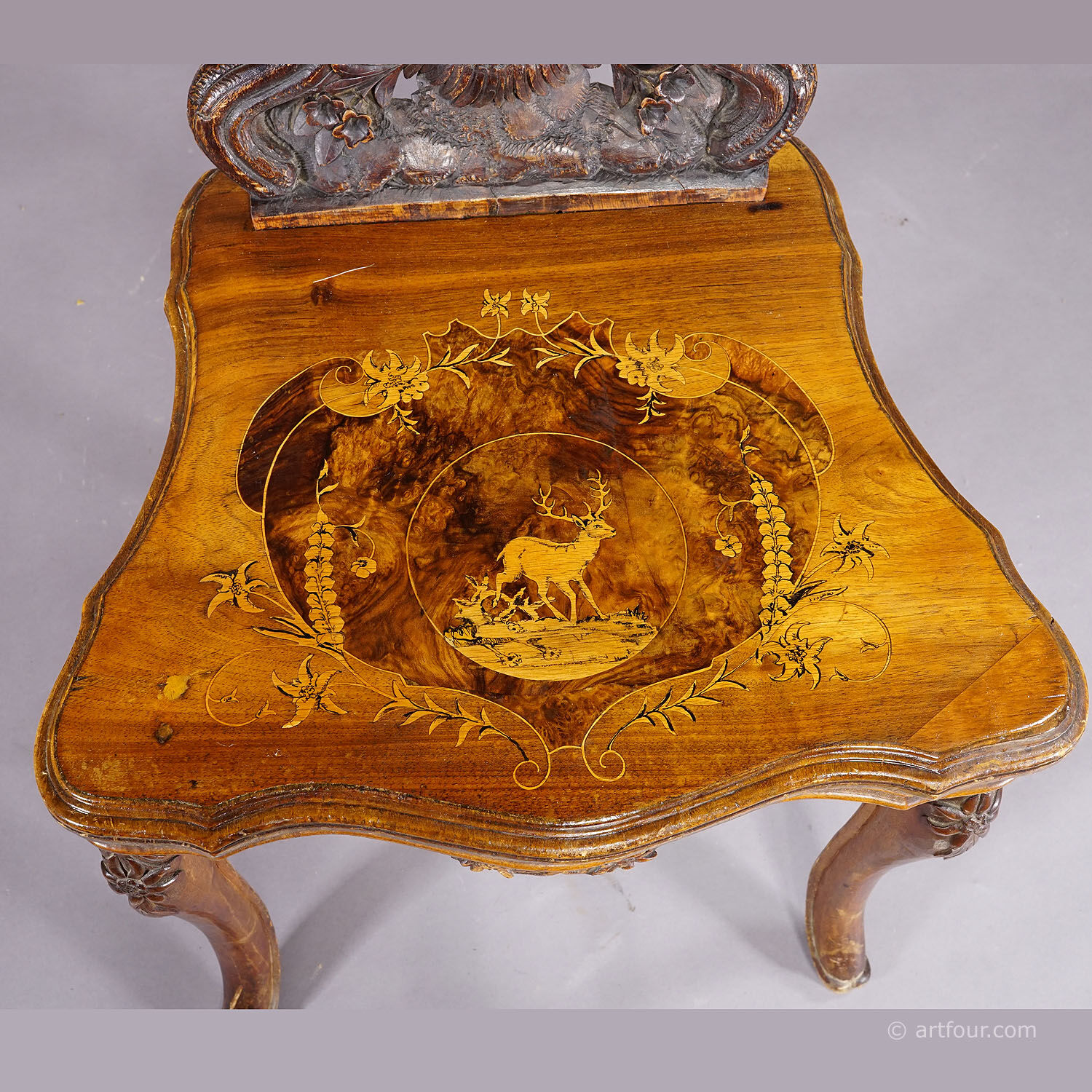 Pair of walnut chairs with Edelweiss marquetry, Brienz Switzerland 1900