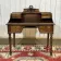 Louis XVI style desk from the late 19th century in walnut with a leather top.