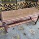Office or piano bench in cannage