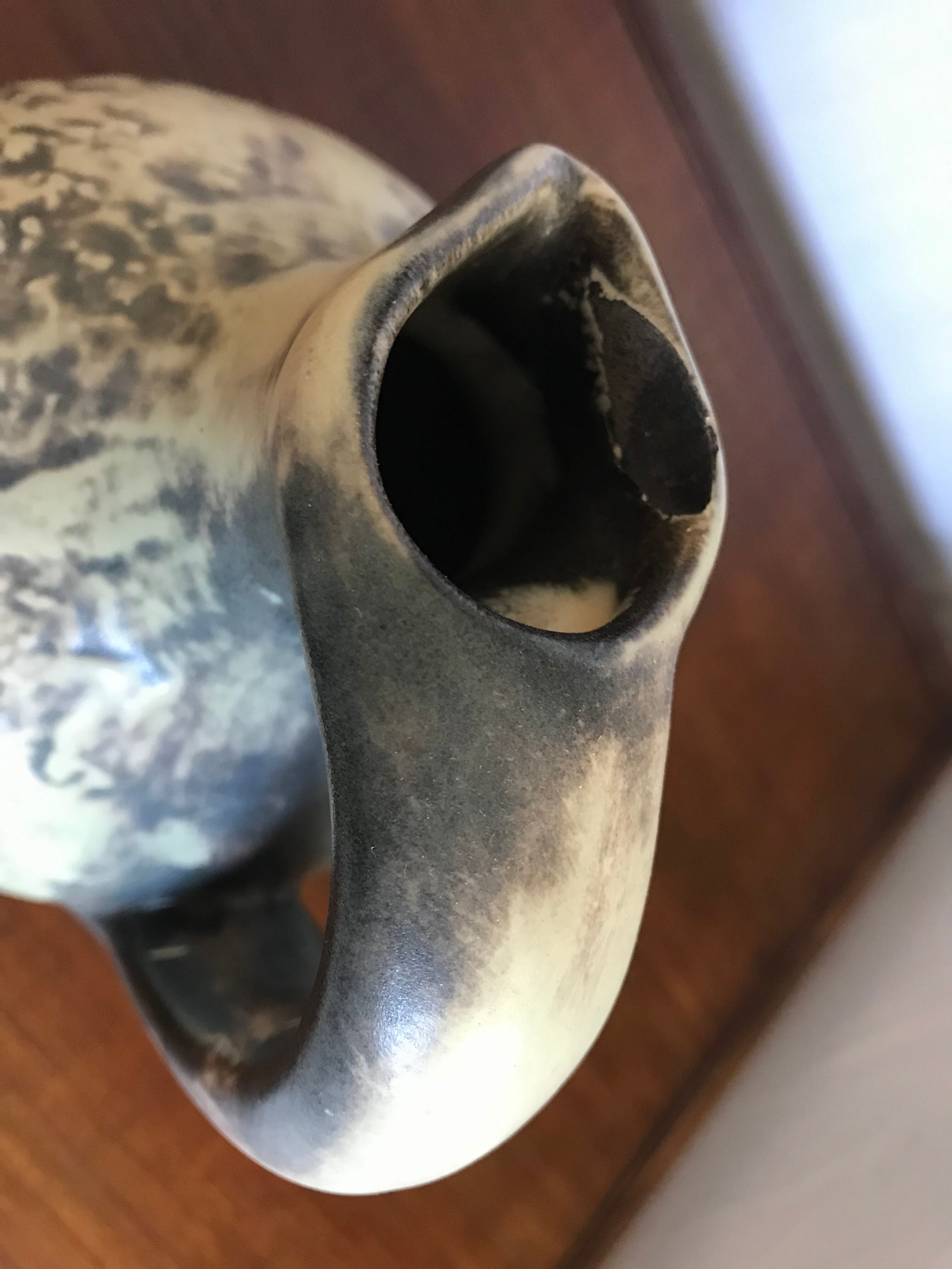 Vintage ceramic pitcher parietal art