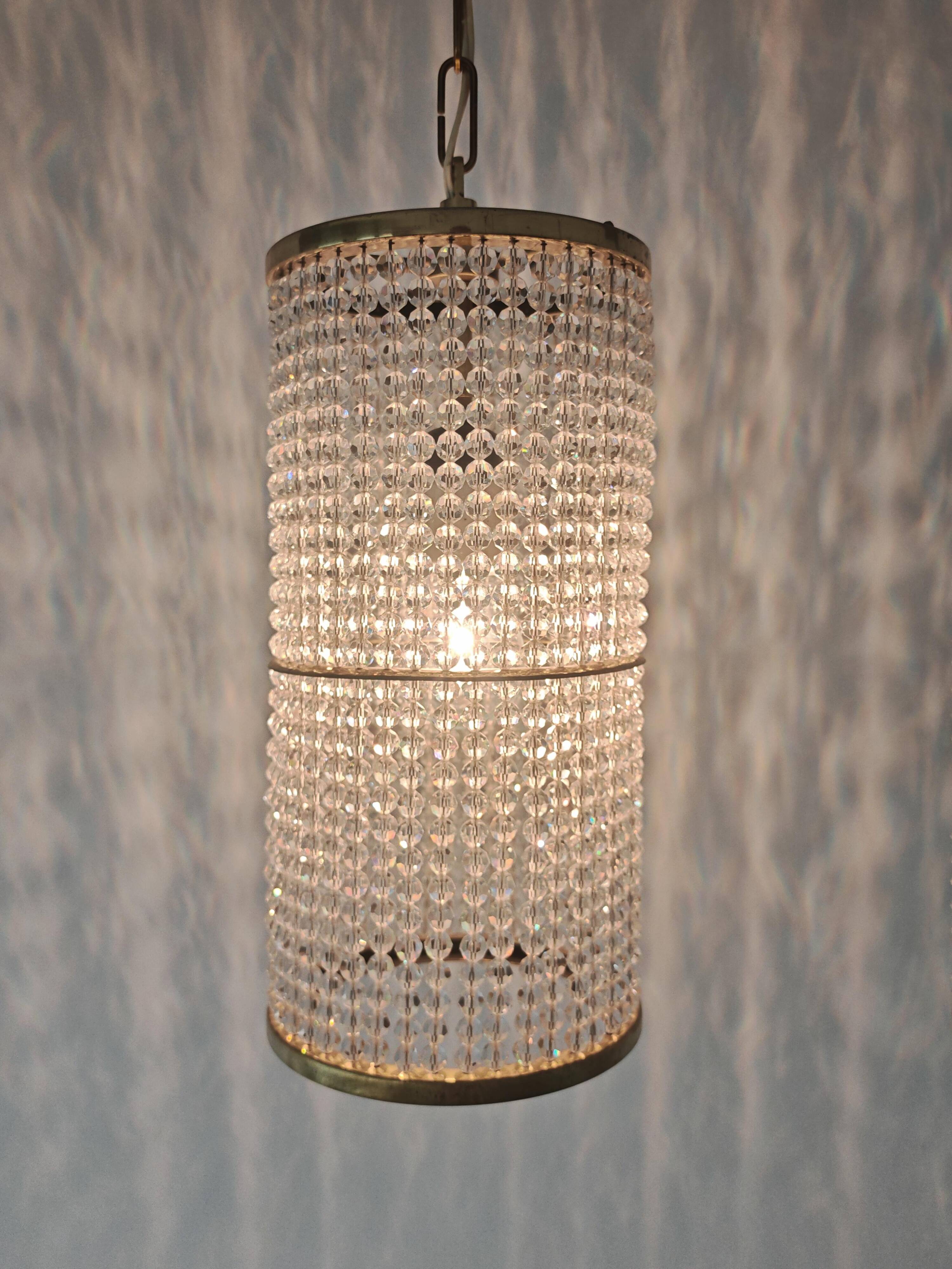 Set of 3 cylindrical crystal chandeliers in mid-century modern style attributed to Lobmeyr.