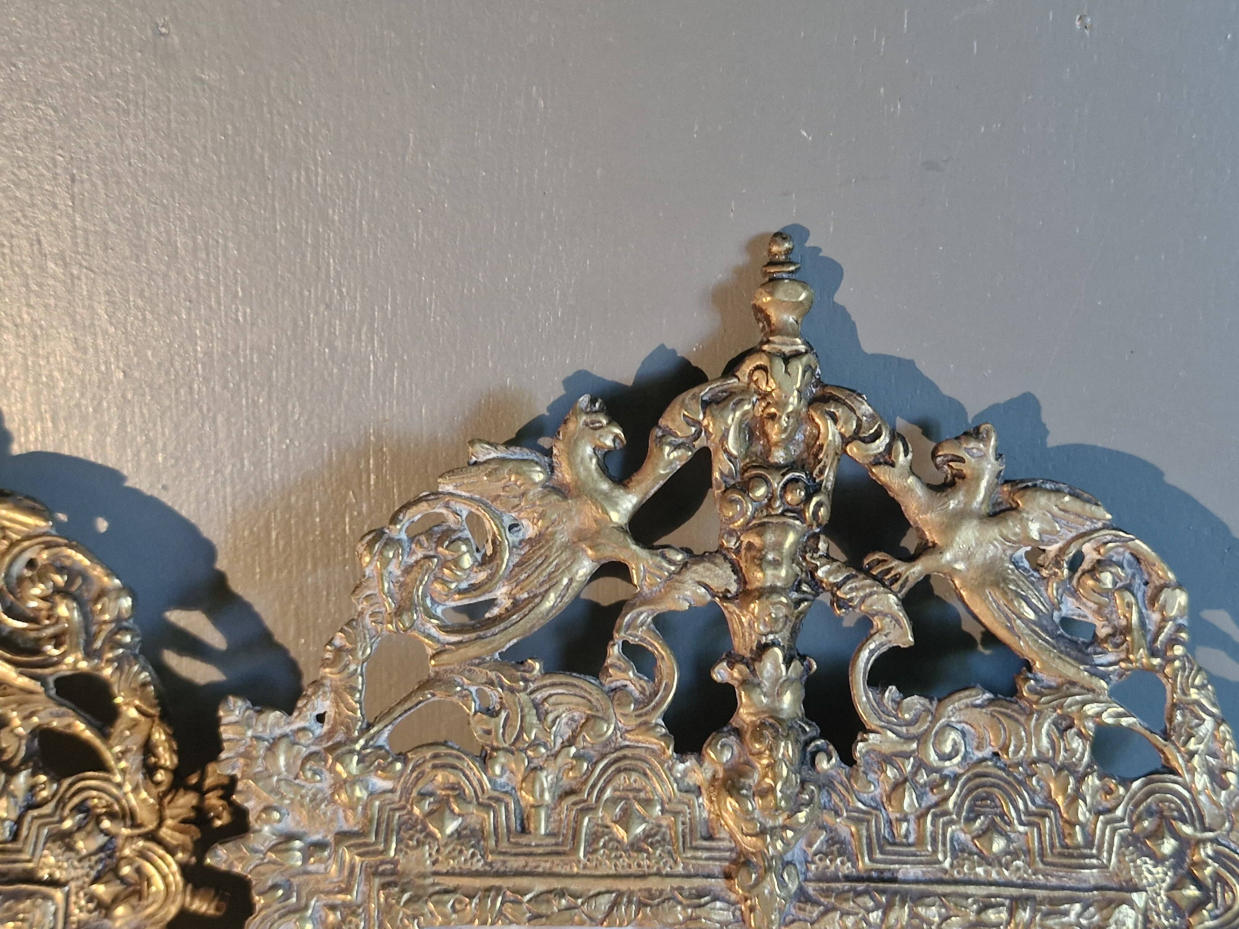 Pair of mirror sconces/candle holders in 19th-century bronze.