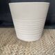 Textured beige cache-pot