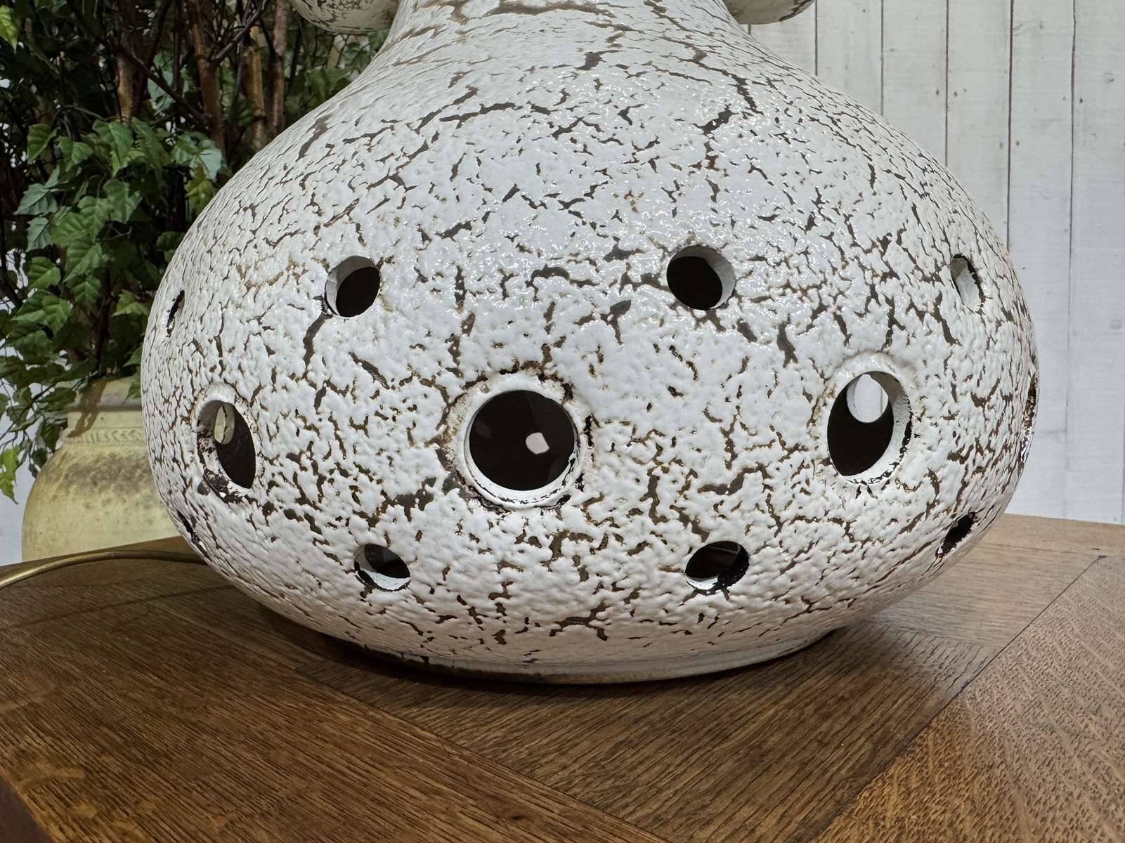 1970s lamp in white ceramic with its period shade.