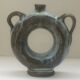 Vernified ceramic vase with handles