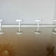 Coat rack in white lacquered metal 70s