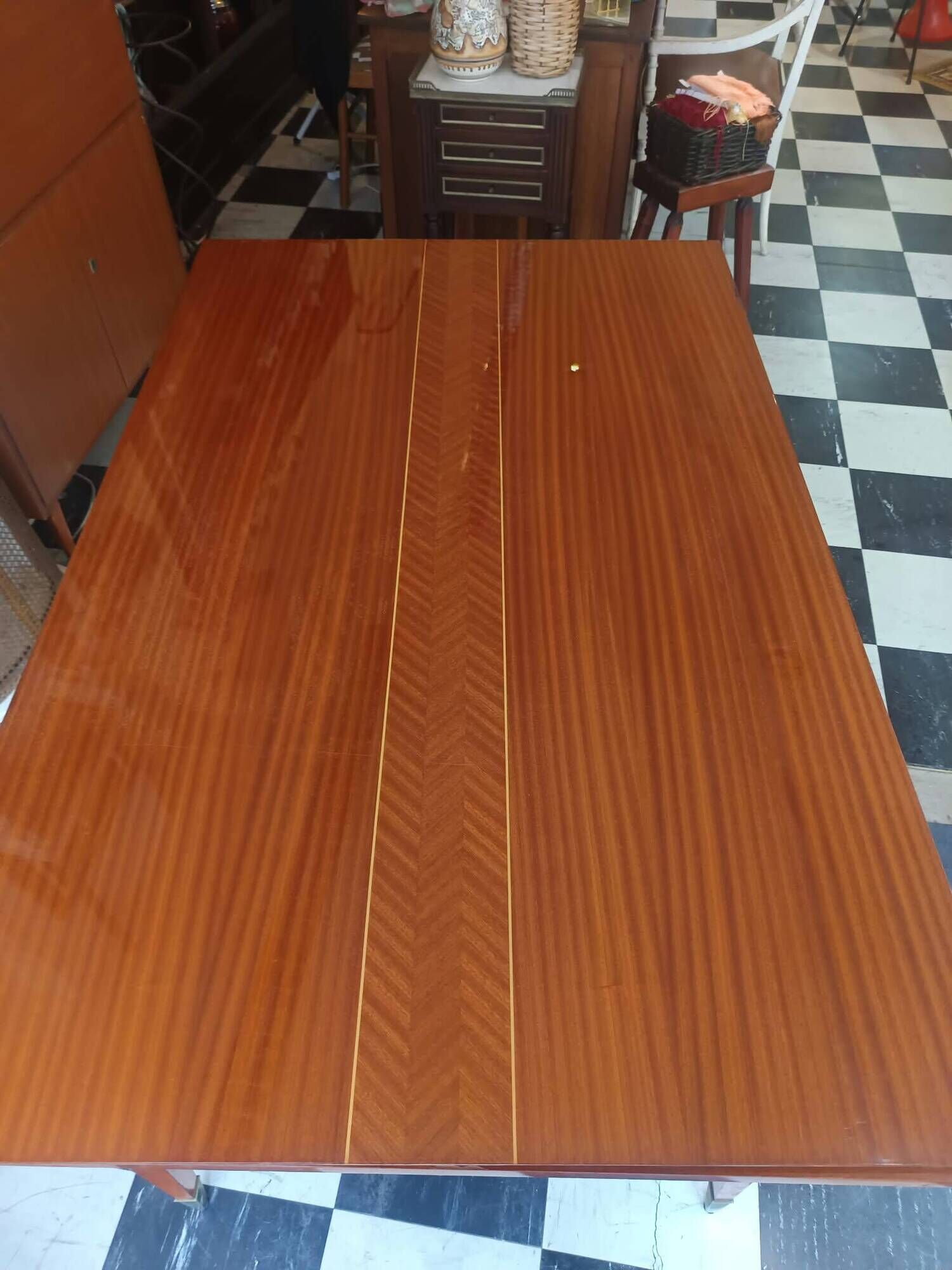 Mid-century vintage coffee table with tapered legs.