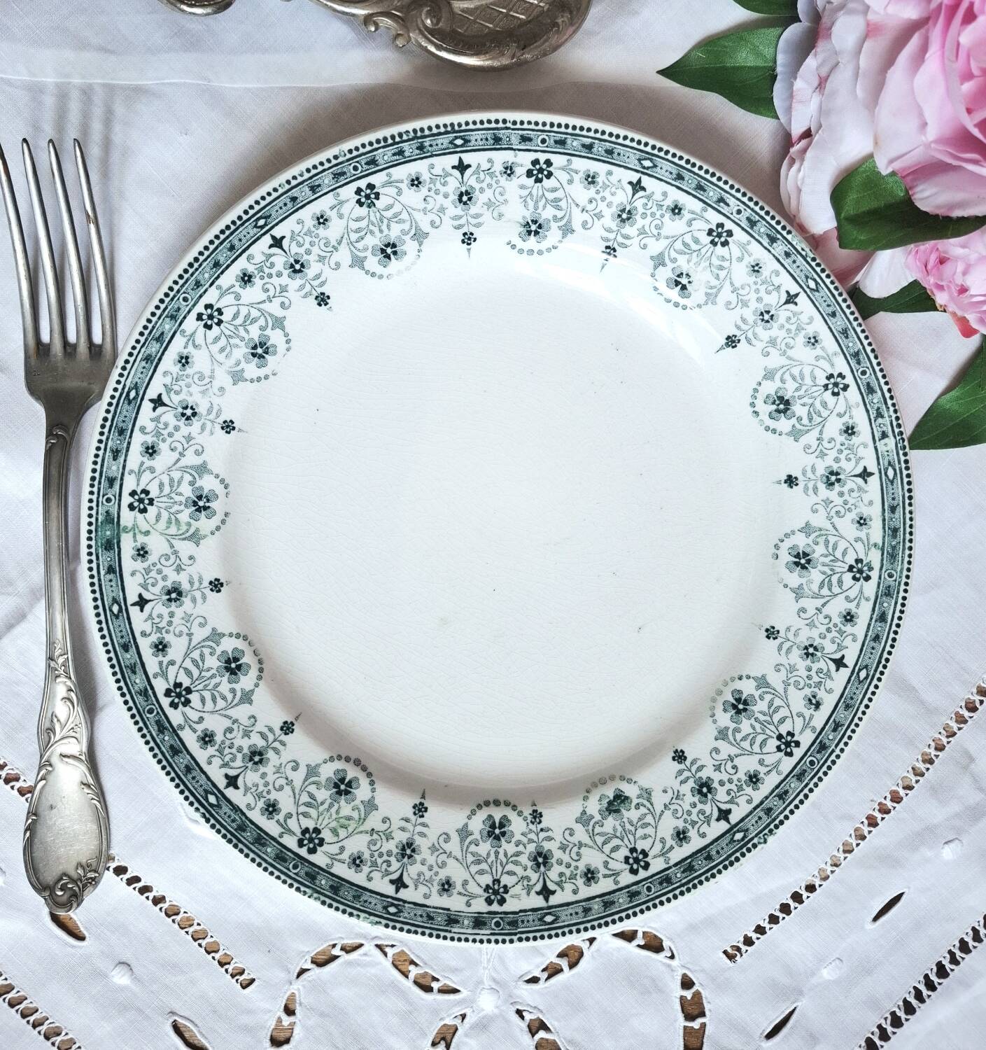 Mismatched antique flat plates made of ironstone accompanied by