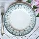 Mismatched antique flat plates made of ironstone accompanied by