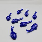 Set of 6 vintage blue porcelain whale knife rests.