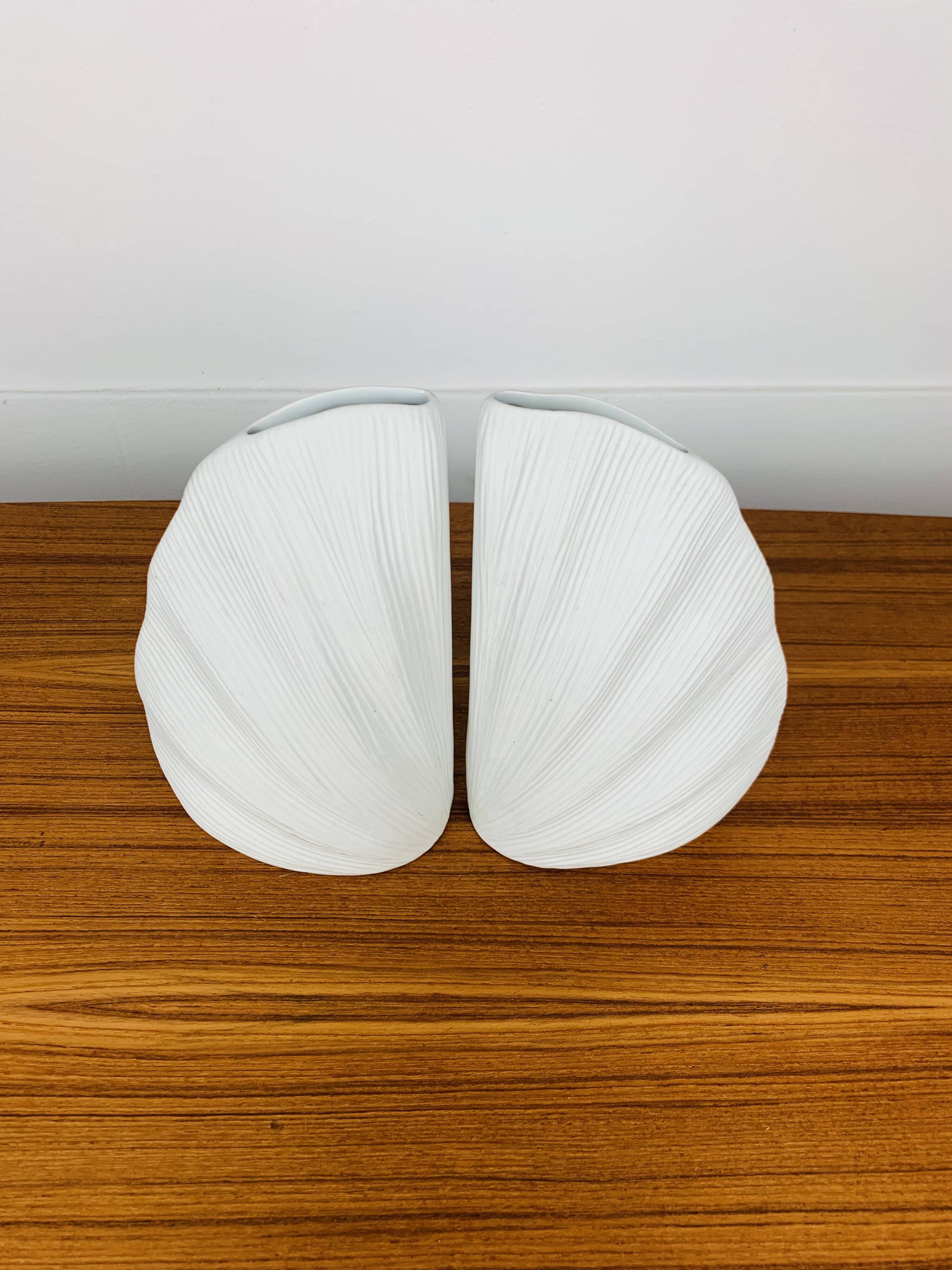 Pair of white ceramic coral vases, bookends