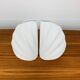 Pair of white ceramic coral vases, bookends