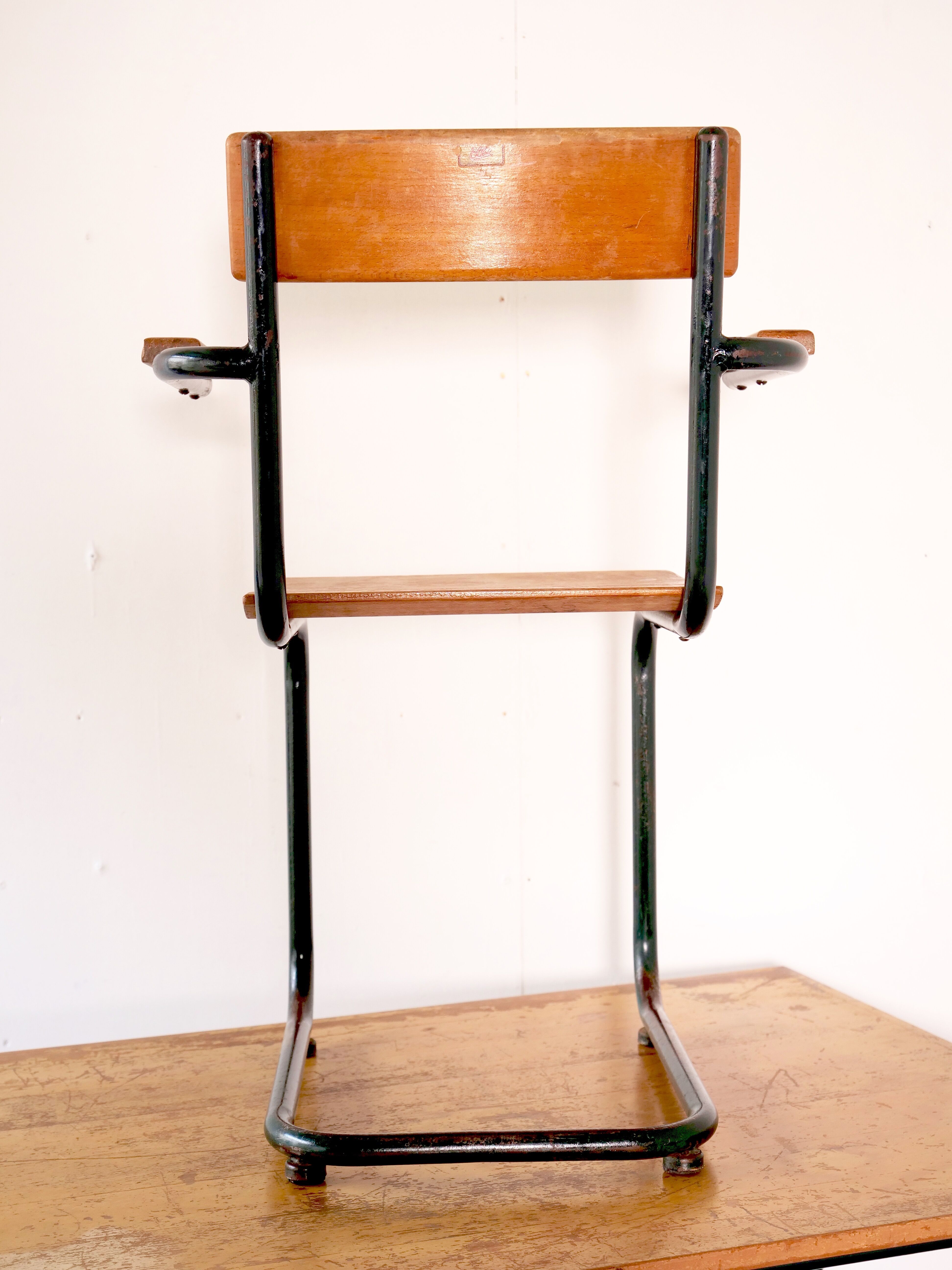 Desk with bauhaus style tubular steel chair