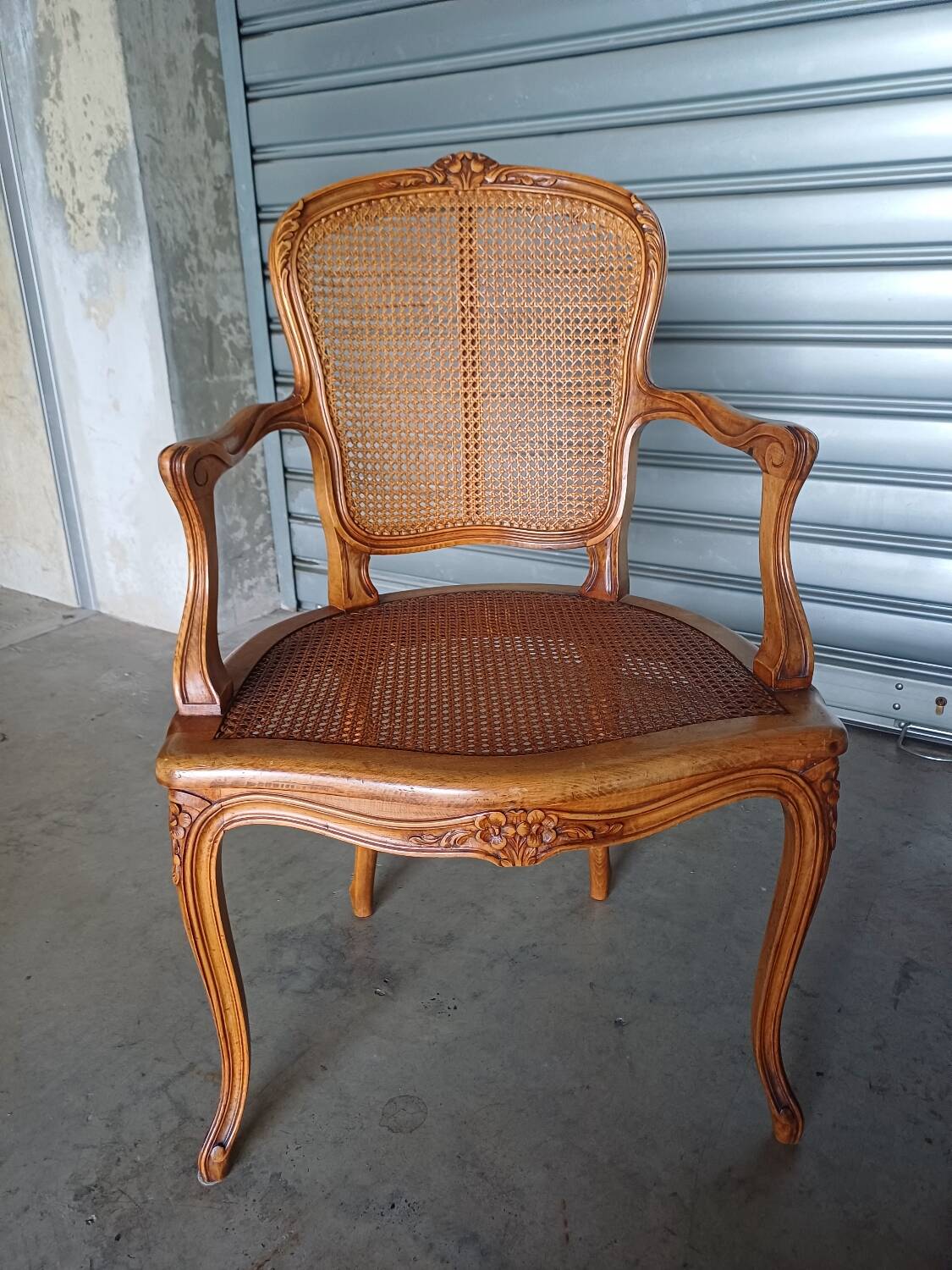 Pair of caned cabriolet armchairs
